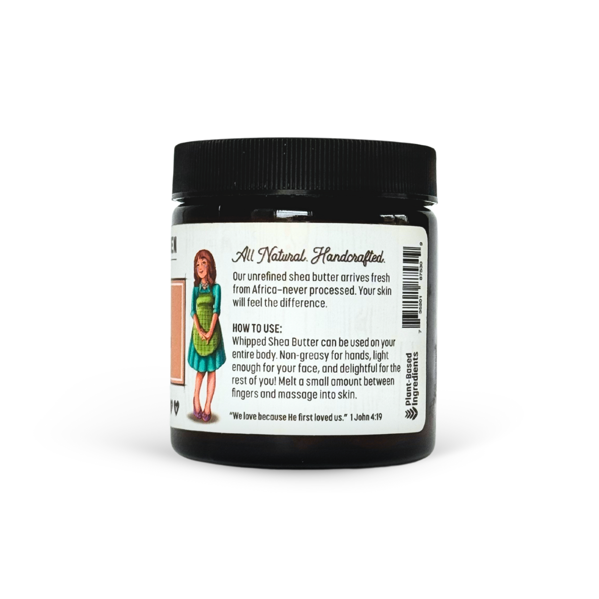 Jar of shea butter with a label on a white background