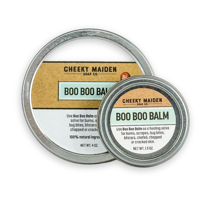 Two tins of Cheeky Maiden Boo Boo Balm on a white background
