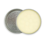 Metallic lid and beige container on a white background