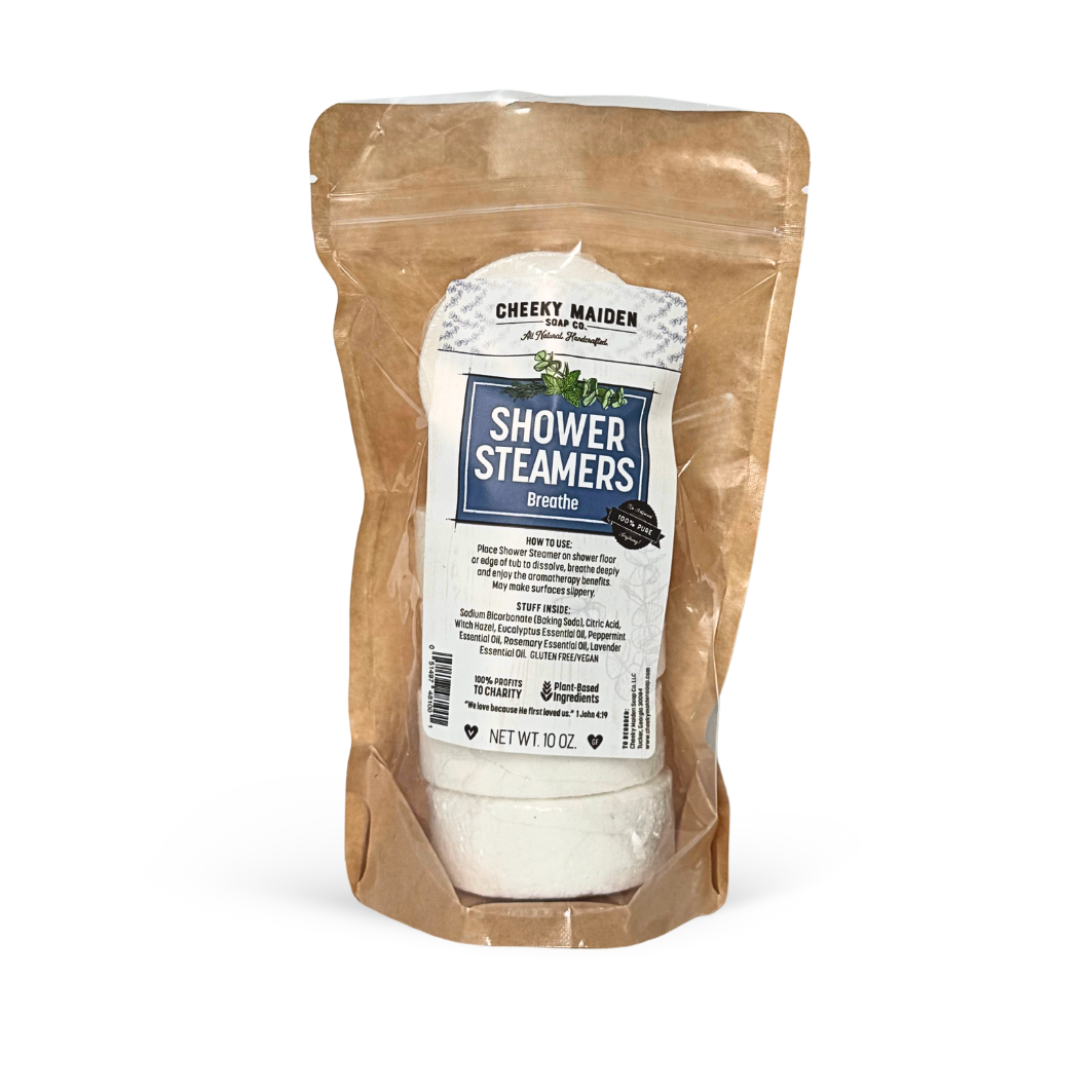 Packaged shower steamers with a visible label on a white background