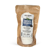 Packaged shower steamers with a visible label on a white background