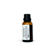 Small amber glass bottle with a black cap on a white background