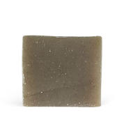 Square bar of soap with a textured surface on a white background