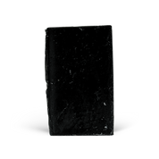 Black rectangular soap on a white background