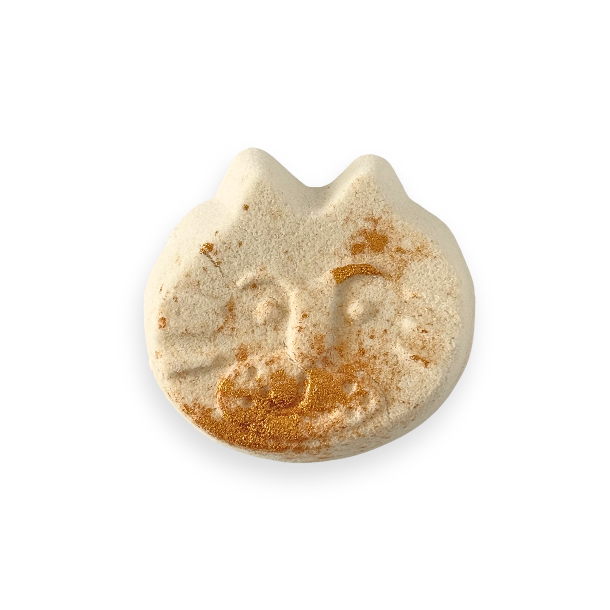 Cat-shaped bath bomb with gold accents on a white background