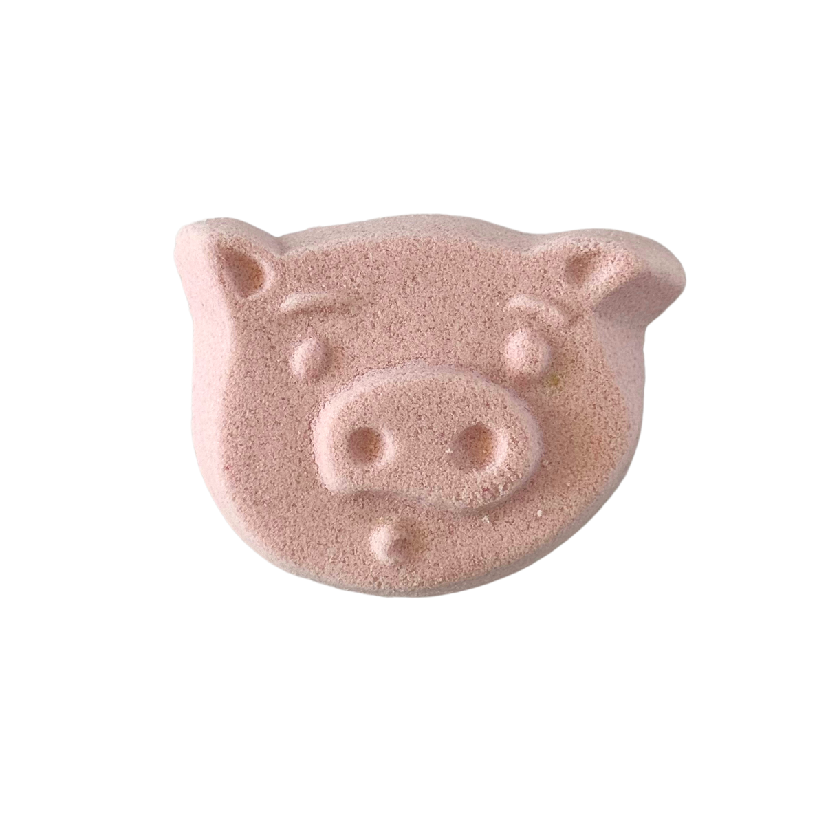 Pink pig-shaped bath bomb on a white background
