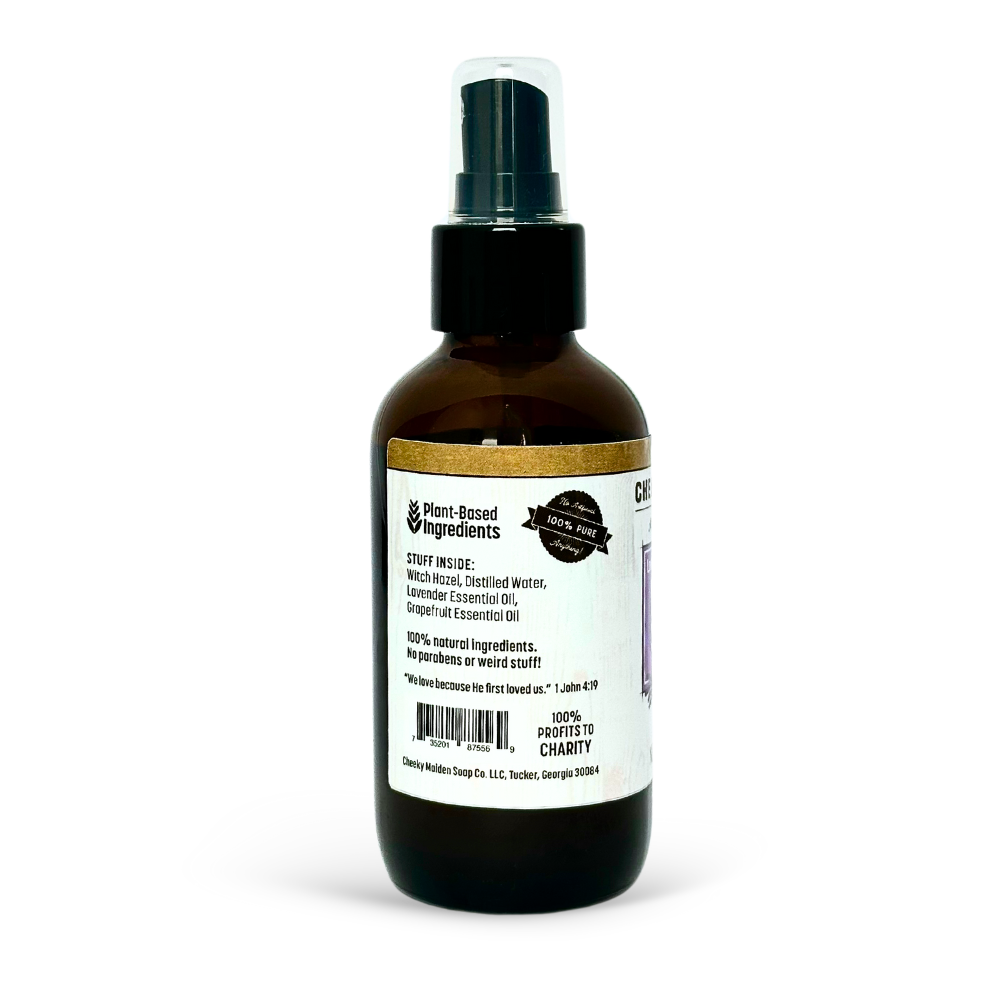 Brown spray bottle with a label on a white background