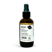 Brown spray bottle with a label on a white background