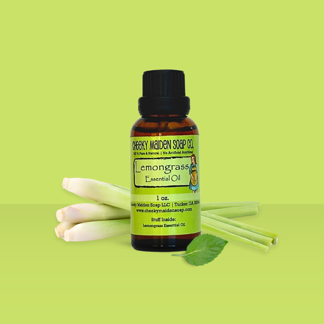 Bottle of Lemongrass essential oil with lemongrass stalks on a green background