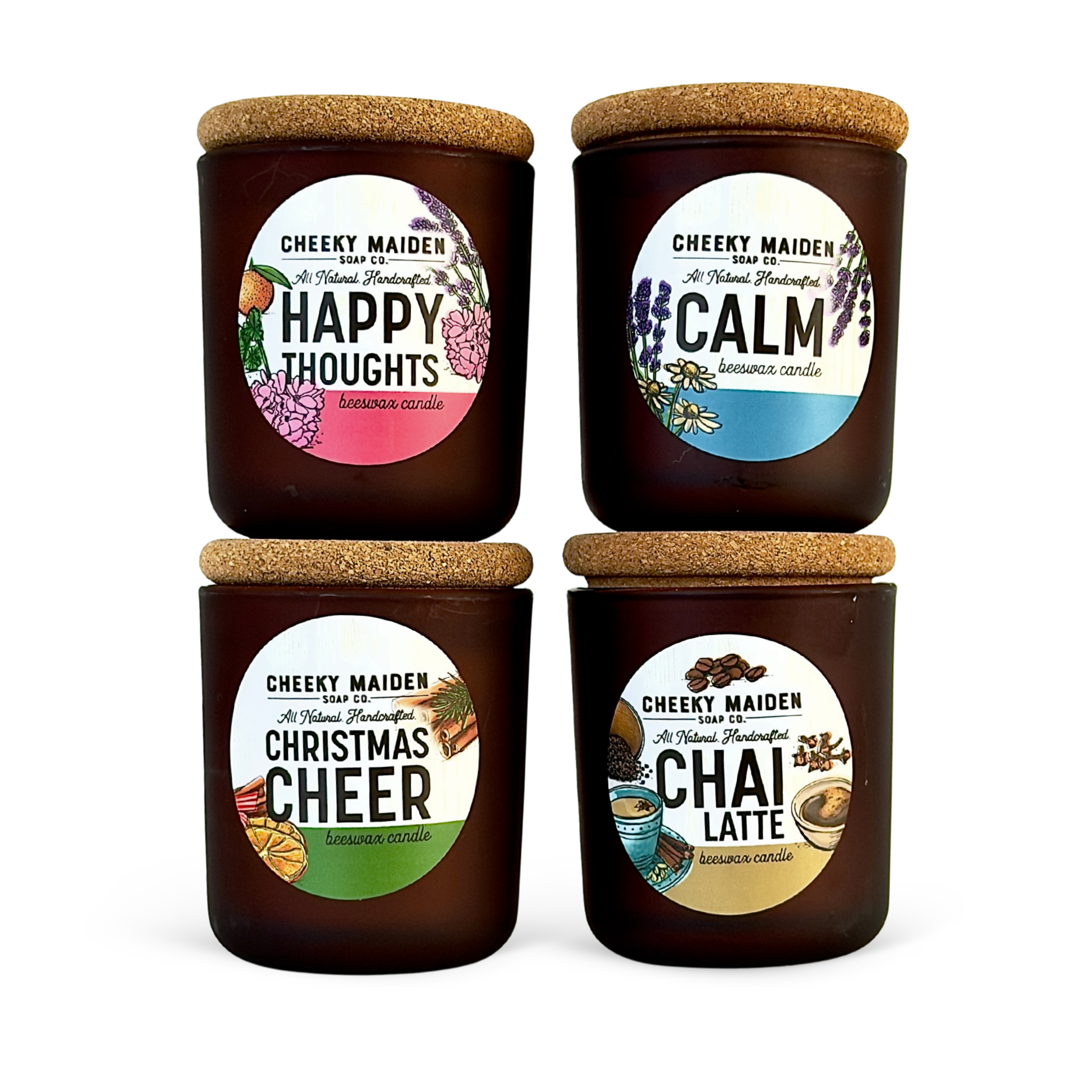 Four candles with labels indicating different scents on a white background