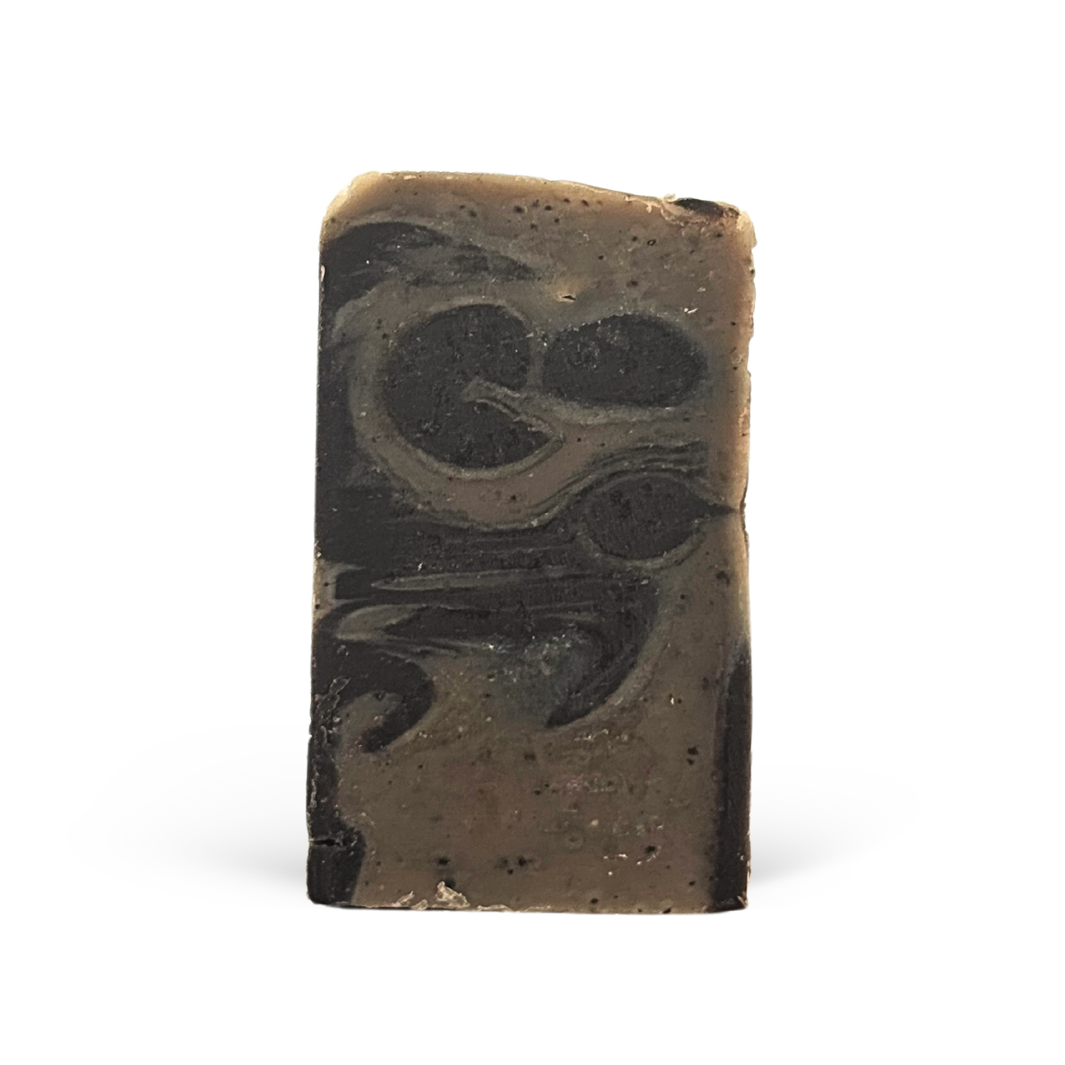 Bar of soap with black and brown marbled pattern on a white background
