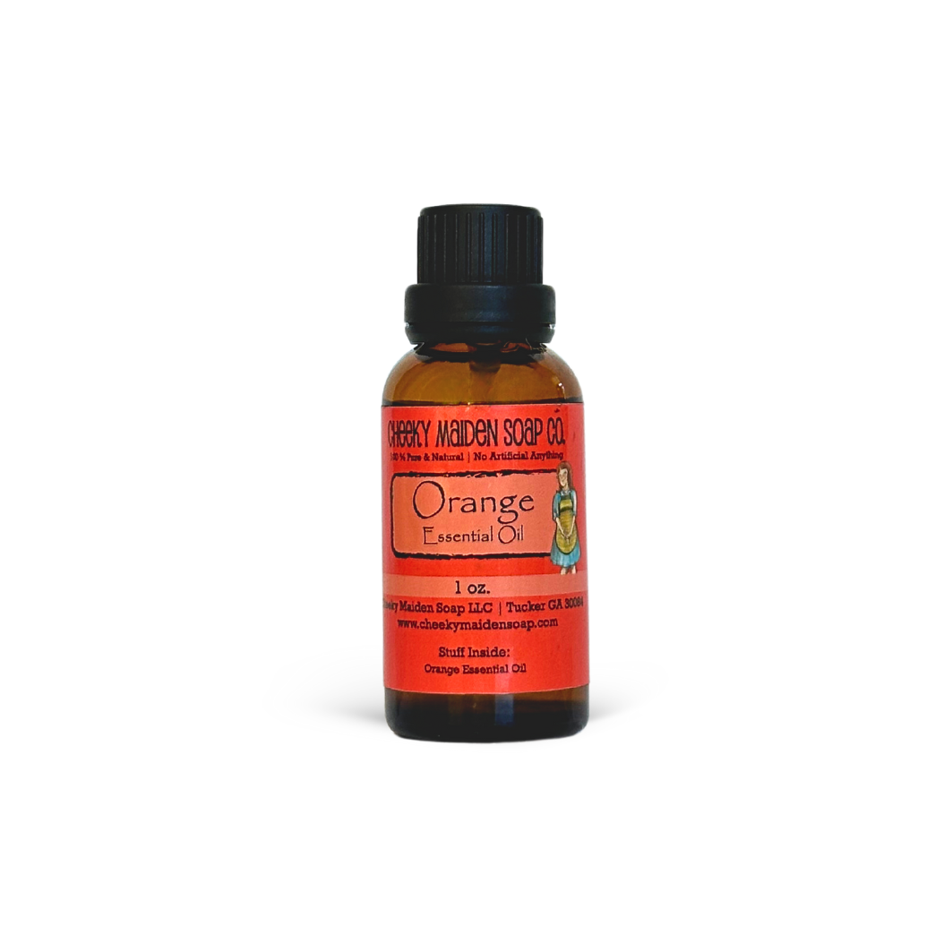 Bottle of Orange essential oil with a red label on a white background
