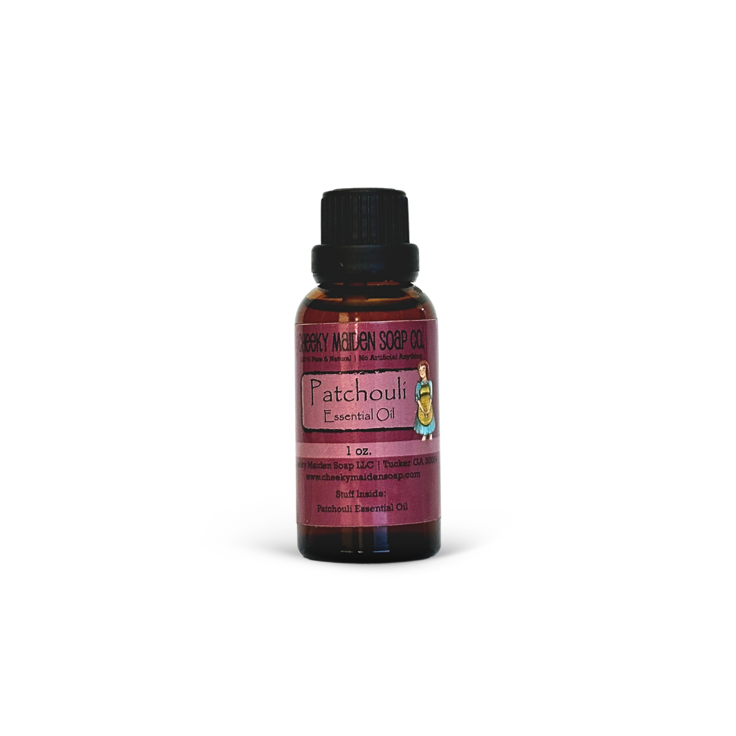 Bottle of Patchouli essential oil on a white background