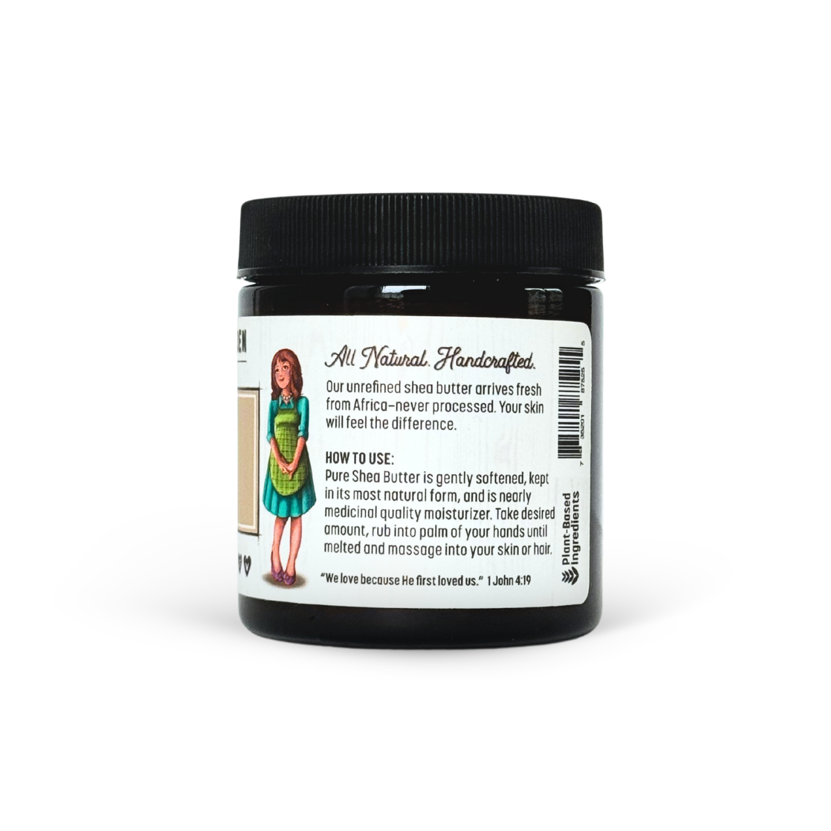 Jar of shea butter with a label on a white background