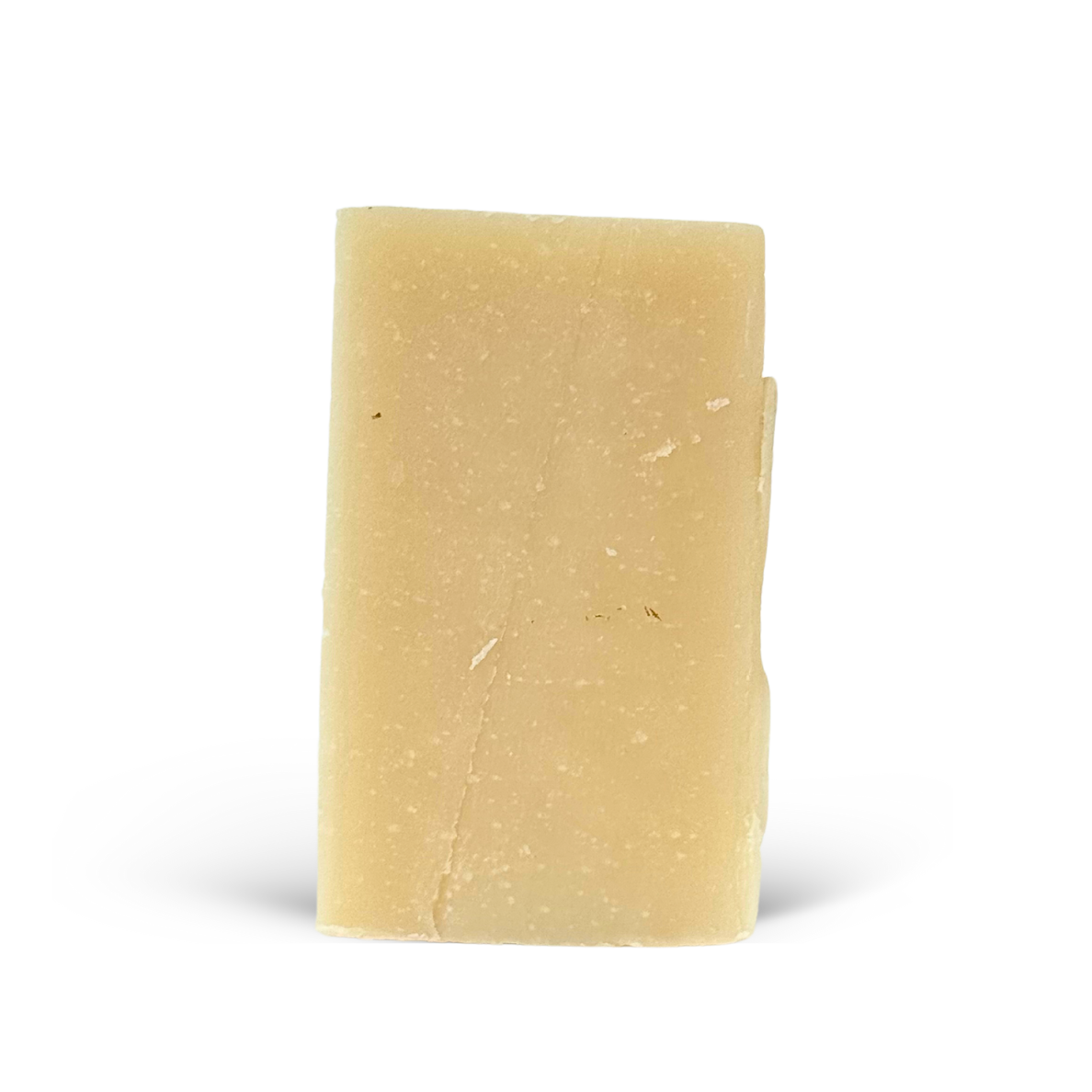 Beige bar of soap on a white background