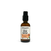 Bottle of 'Glow Getter' sea buckthorn oil with a white label on a white background