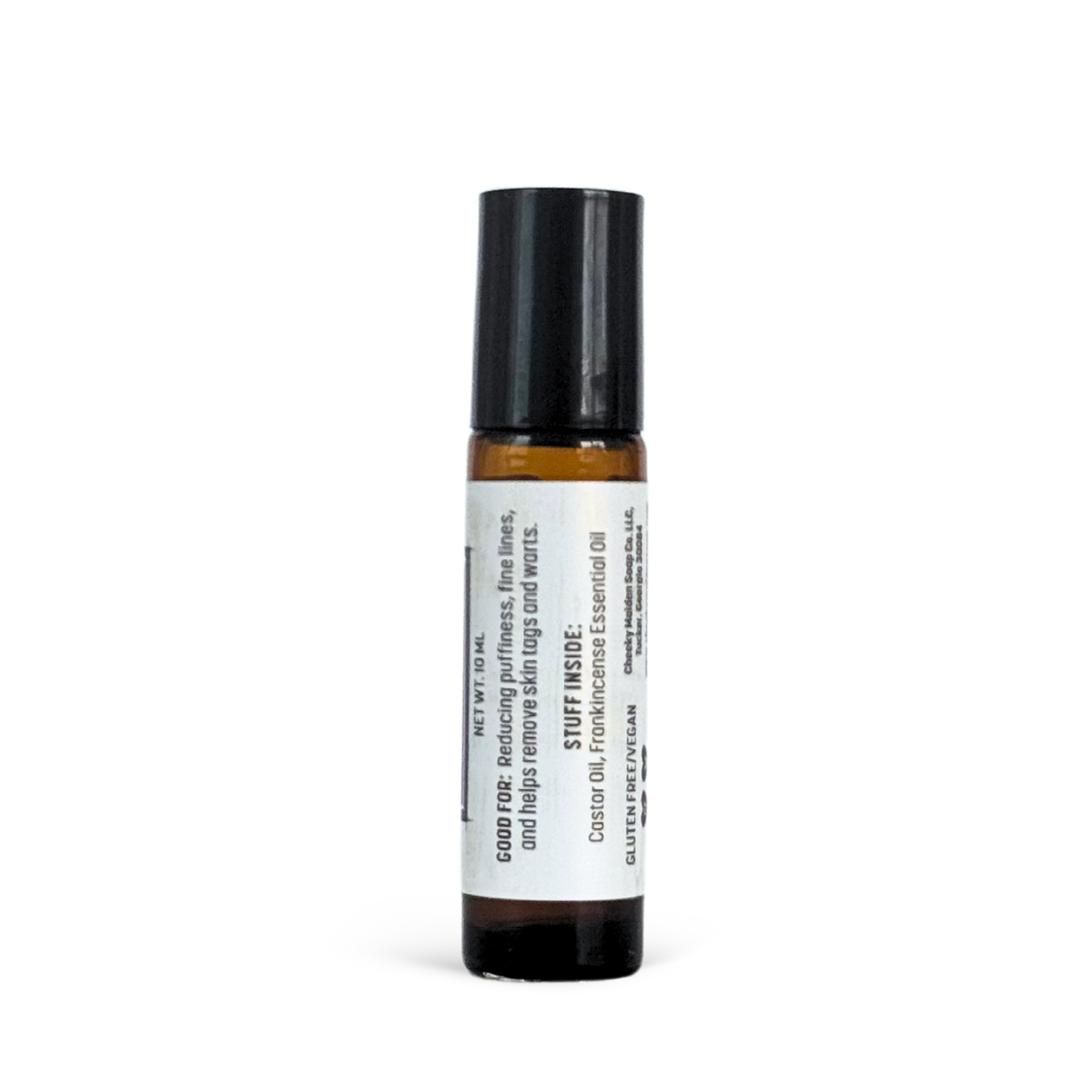 Small essential oil bottle with a black cap on a white background