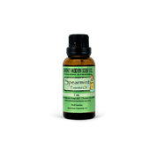 Spearmint essential oil bottle with green label on a white background
