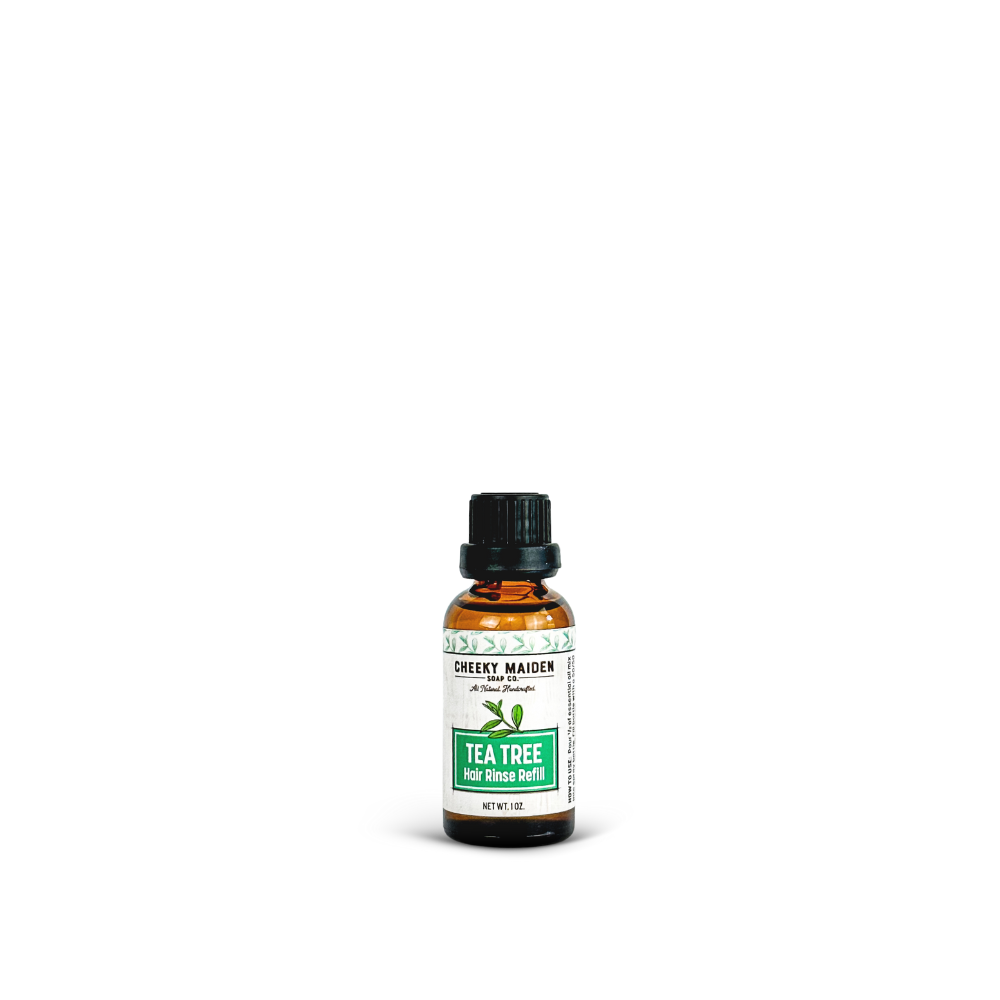 Bottle of Skeezy Maider Tea Tree oil on a white background